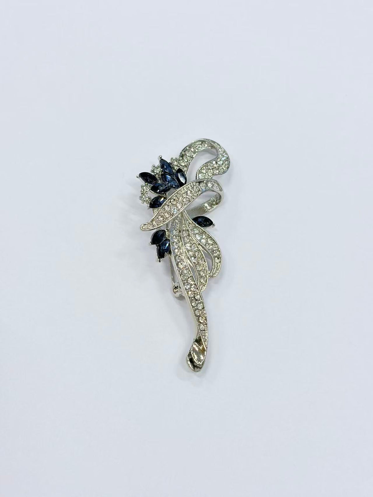 Crystal floral brooch pin front view on white background