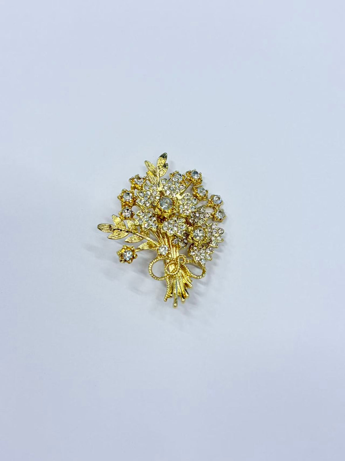 Crystal flower bouquet brooch pin front view on white background