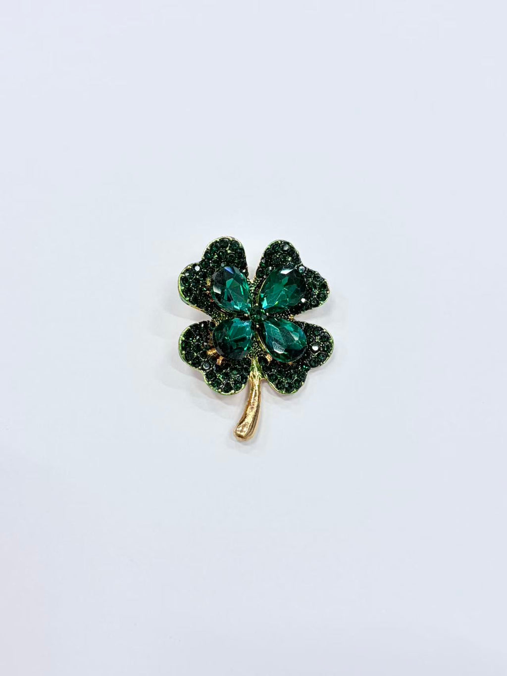 Crystal four leaf clover brooch pin front view on white background