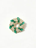 Crystal leaf wreath brooch pin front view on white background