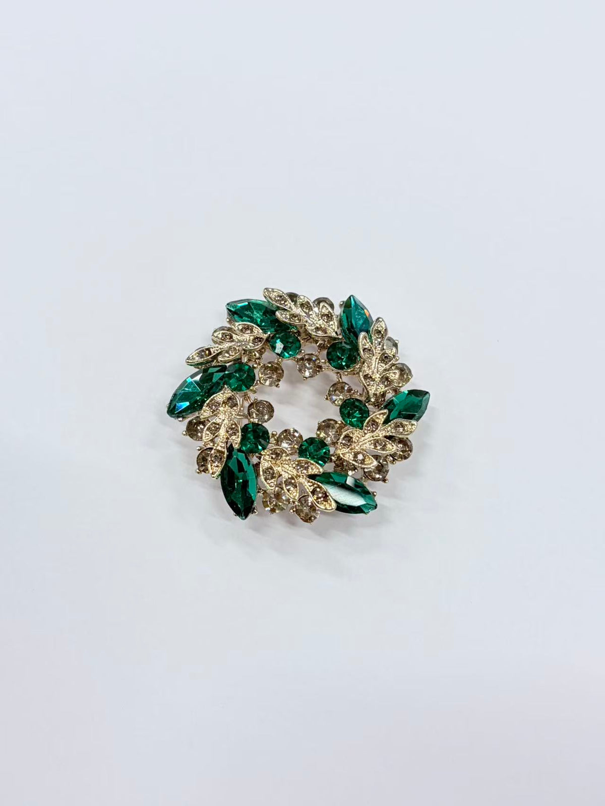 Crystal leaf wreath brooch pin isolated view on white background