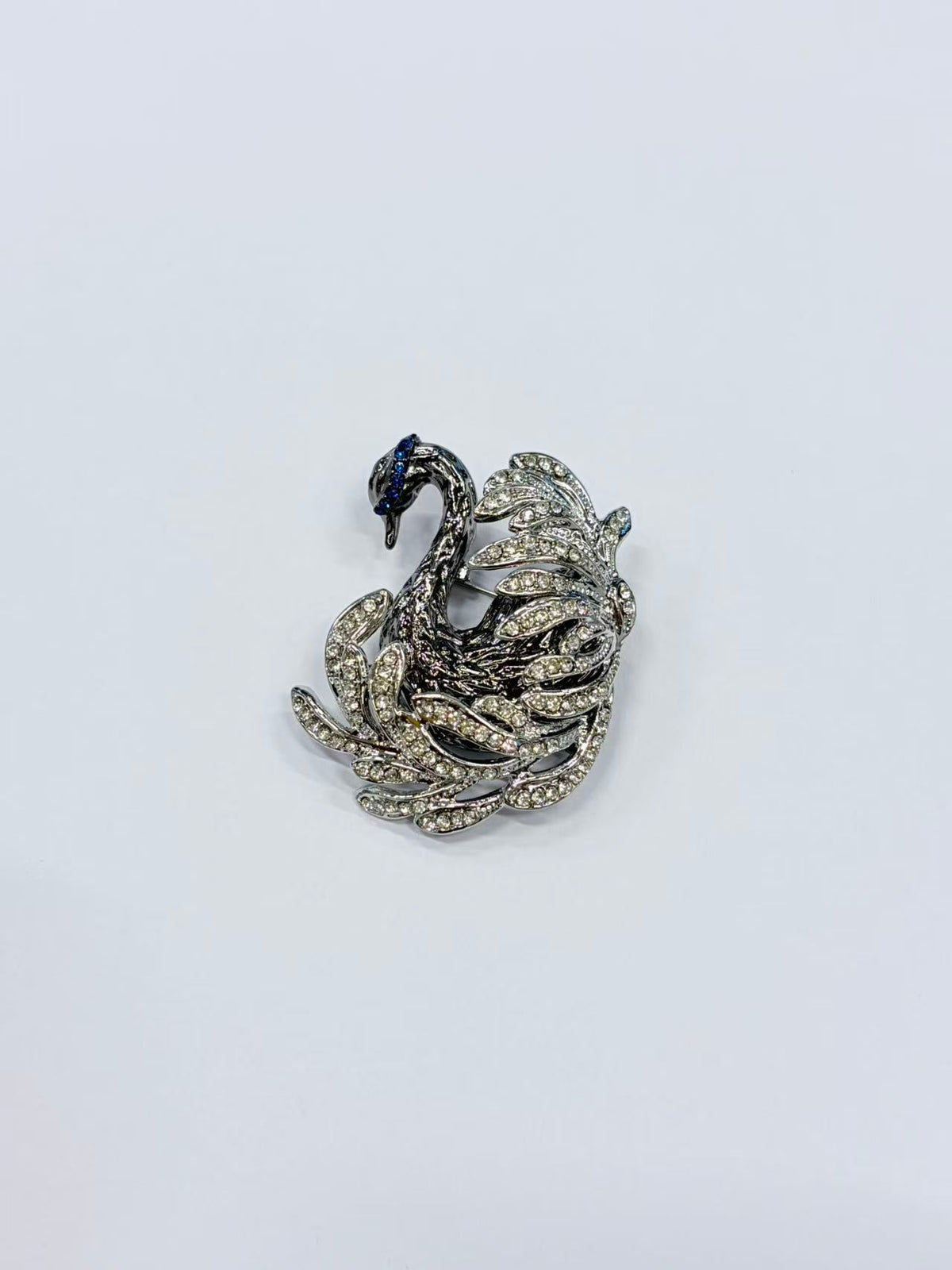 Crystal swan brooch pin front view on white background